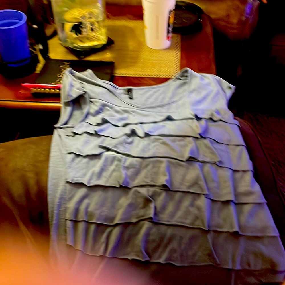 I’m selling a blue shirt. It’s original brand is Maurice’s.